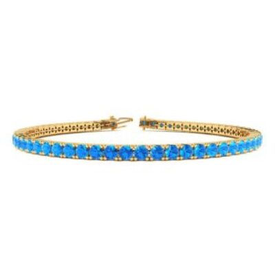 Blue Gemstones | December Birthstone | Blue Topaz Bracelet | 5 1/4 Carat Blue Topaz Tennis Bracelet In 14 Karat Yellow Gold, 7 Inches | SuperJeweler