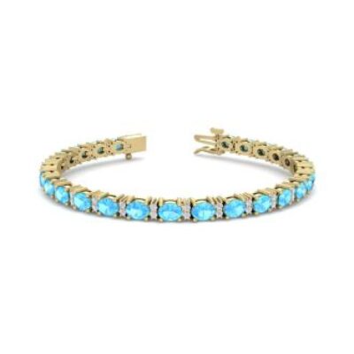 December Birthstone | Blue Topaz Bracelet | 6 Carat Oval Shape Blue Topaz and Diamond Bracelet In 14 Karat Yellow Gold | SuperJeweler